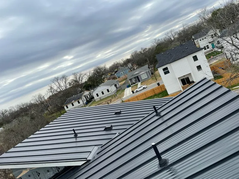 Standing seam metal roof panels with vents for Skylight Repair in Trinity